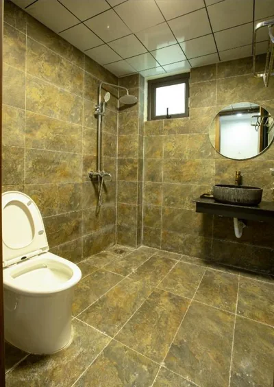 Twin Room with Balcony — Tom Central Homestay